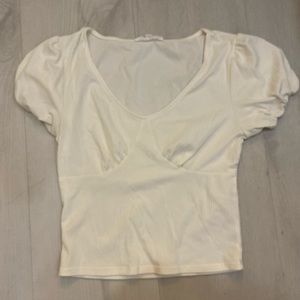 Pink Rose white tee shirt in size medium.